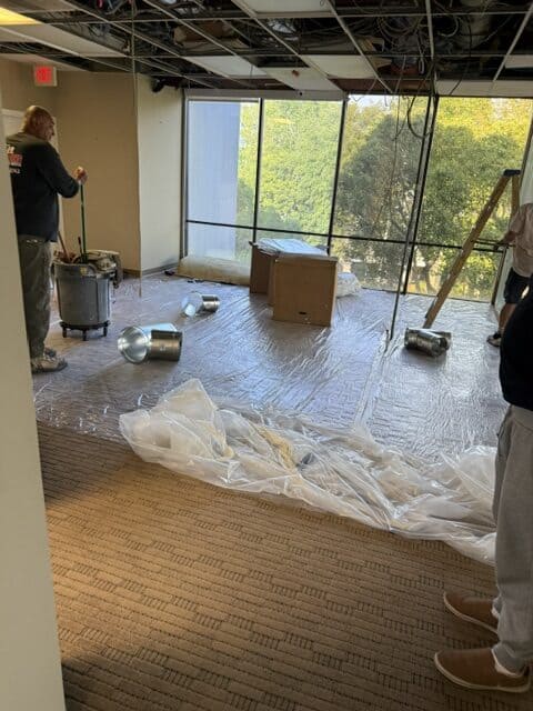 Drywall installation with ceiling work at Enriquez Drywall INC in a commercial space.