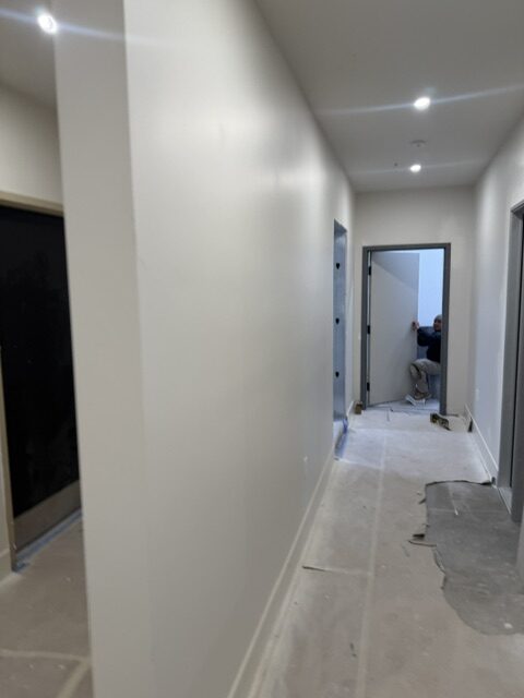 Interior drywall installation with smooth wall finish in a residential space.
